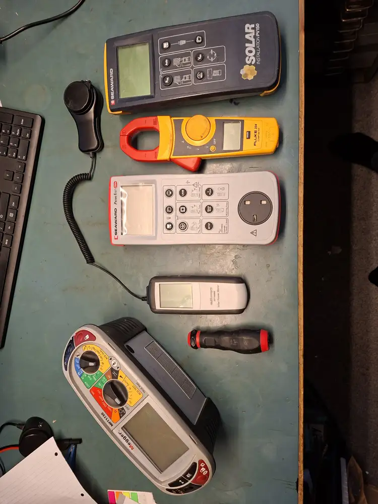 Test instruments laid out on the bench ready for calibration