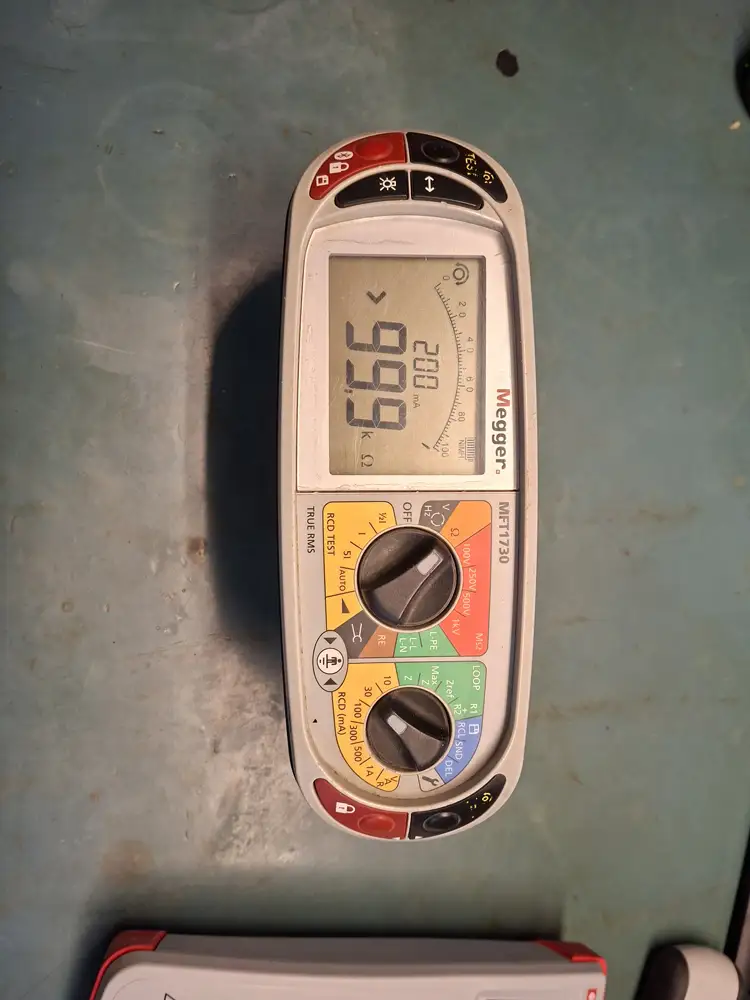 Multifunction tester showing its rotary dial and display